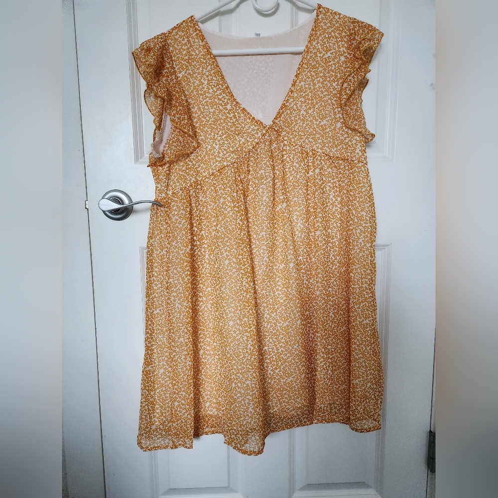 Gaovot Baby doll shaped dress, oversized look in a size medium.